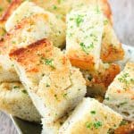 Dry toasting the garlic cloves before mixing them in with the buttery topping is what makes this the best garlic bread.