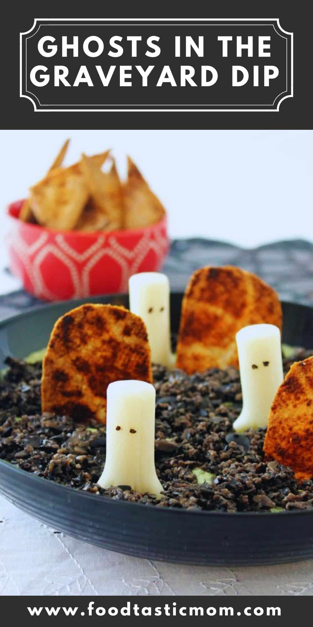 Ghost in the Graveyard Dip is a simple white bean and parsley hummus topped with finely chopped black olive. Mozzarella sting cheese ghosts and quick baked tortillas cut in the shape of grave stones make this a festive and healthy treat for ghosts and goblins of any age! via @foodtasticmom