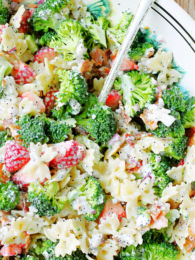 a bowlful of summer broccoli pasta salad ready to serve