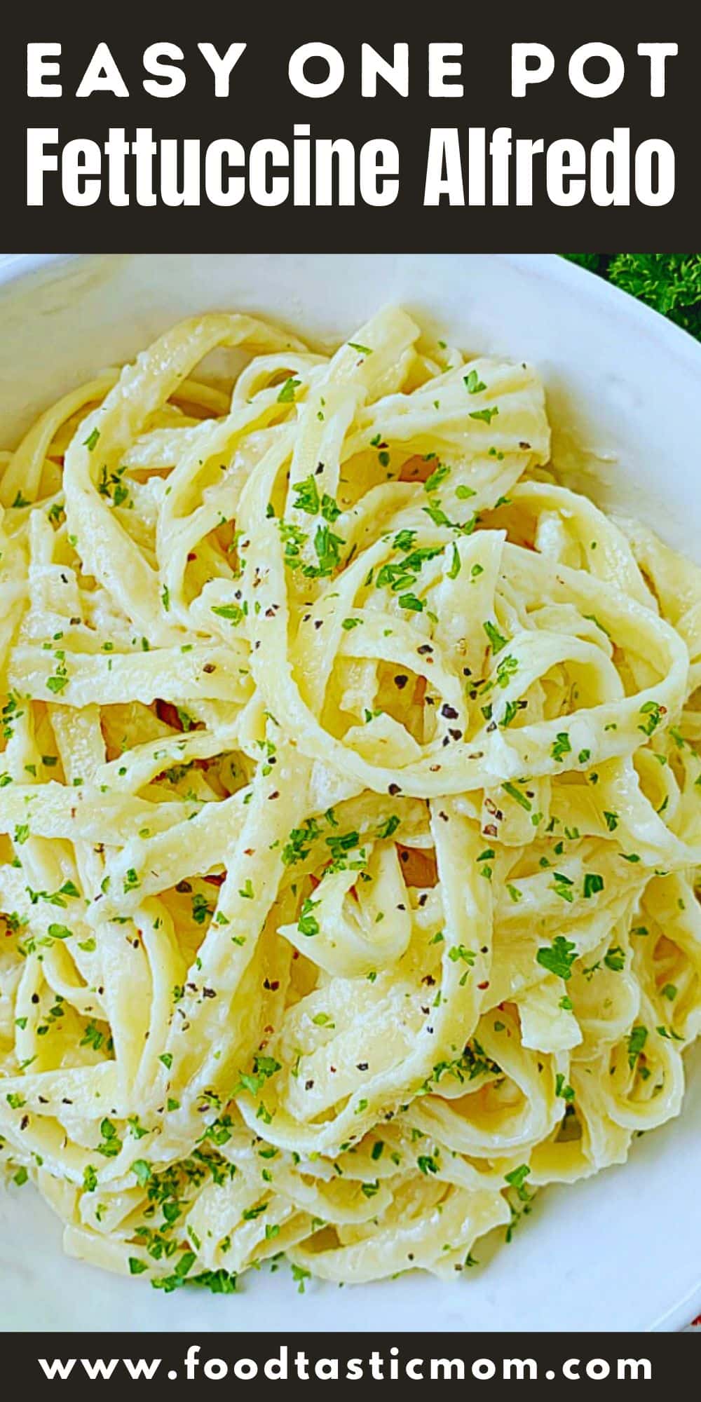 Fettuccine Alfredo is a classic American pasta dish with just a few simple ingredients. It pairs beautifully with shrimp or chicken and is a favorite in our house with my kids! via @foodtasticmom