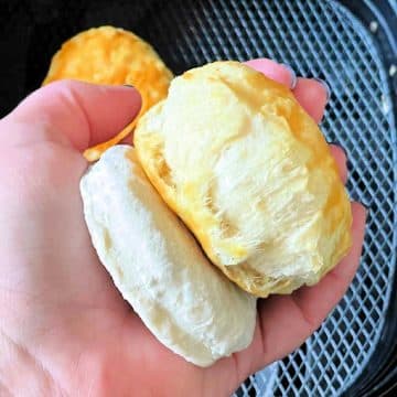 showing a frozen biscuit side by side with one cooked in the air fryer