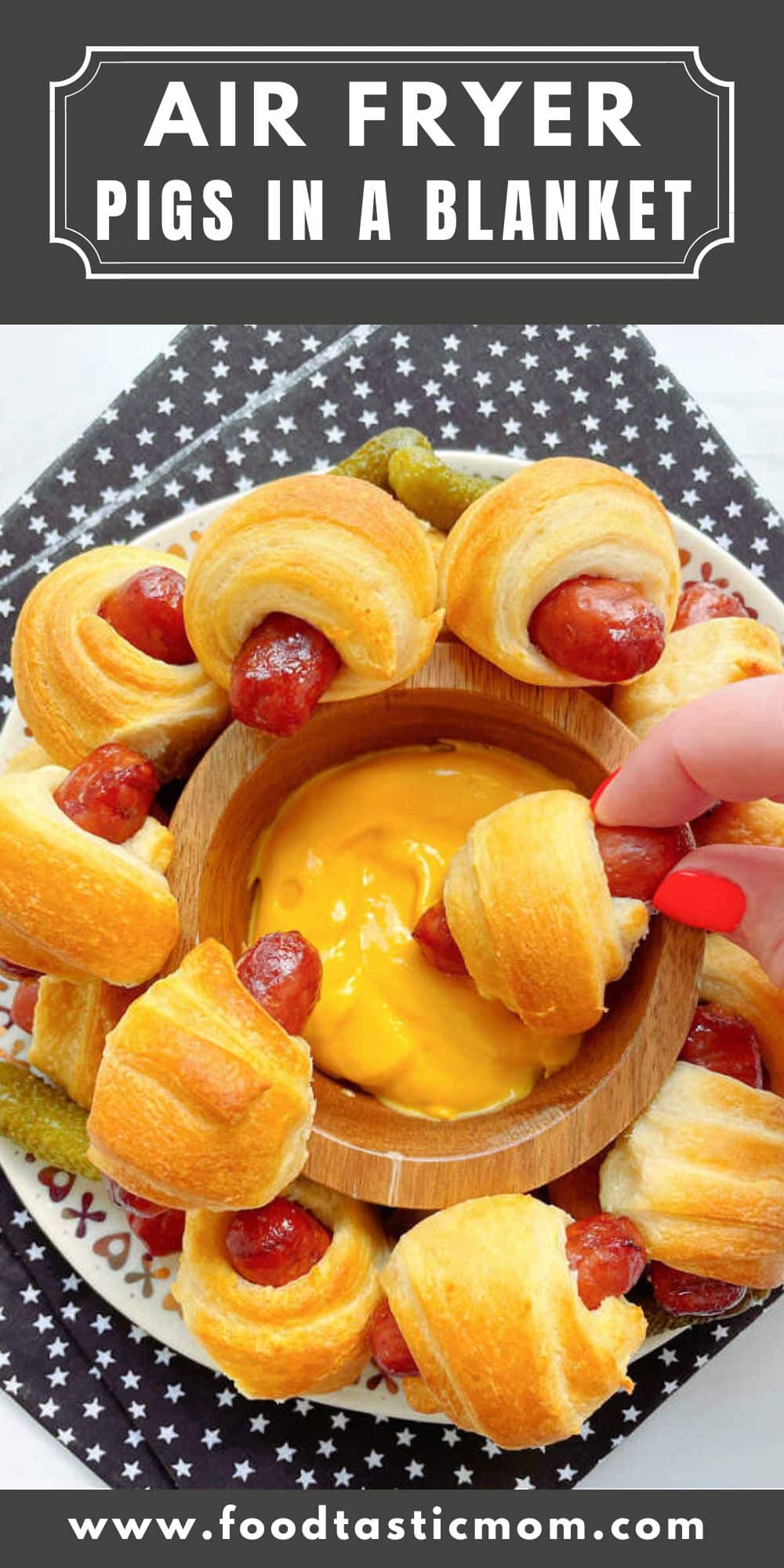 Air Fryer Pigs in a Blanket made with little smokies and crescent dough are a simple snack recipe for game days or an after school snack.  via @foodtasticmom