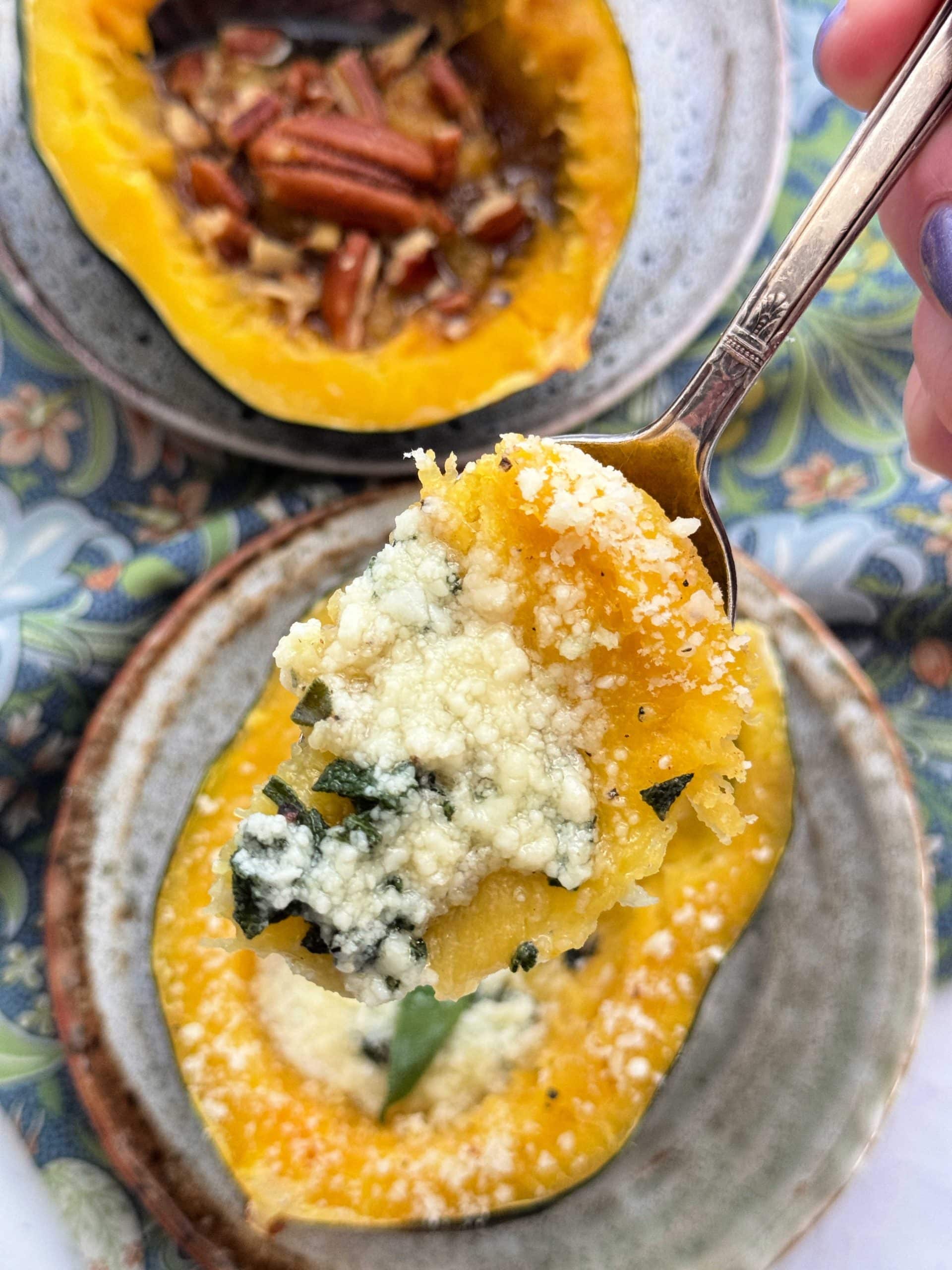 taking a bite of buttery herbed Parmesan acorn squash