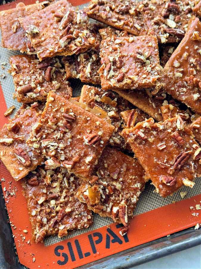 showing the finished praline grahams on the sheet pan lined with a Silpat liner